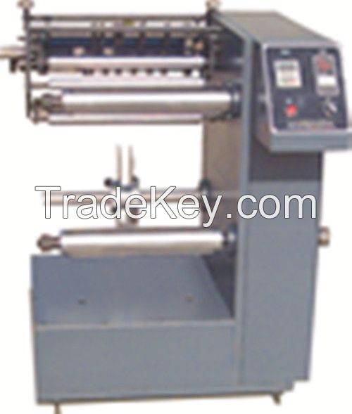 Adhesive label slitting machine