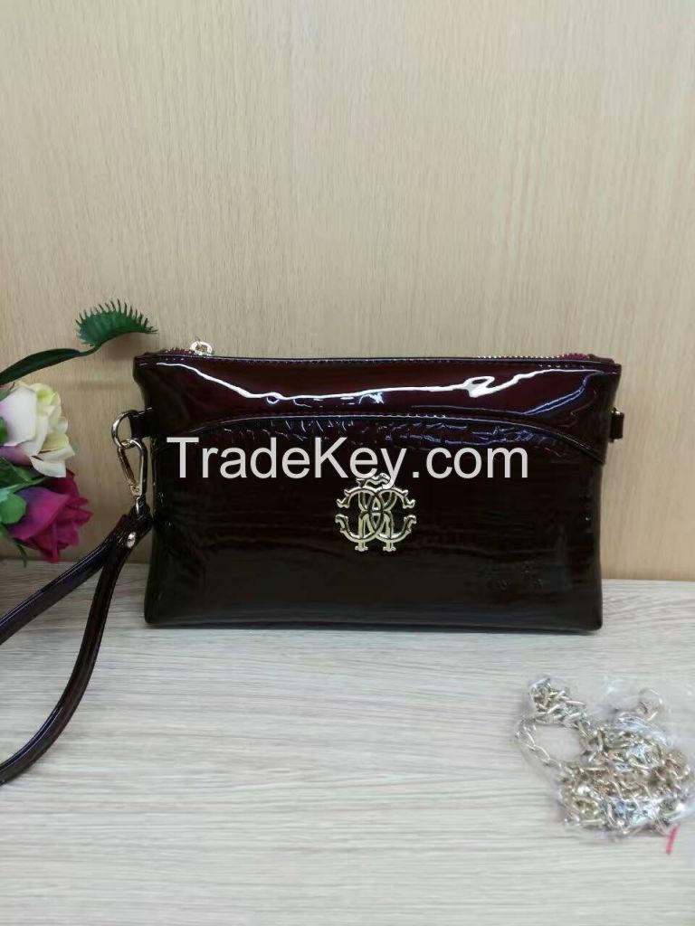 China Wholesale Black Fox Button Clutch Bag