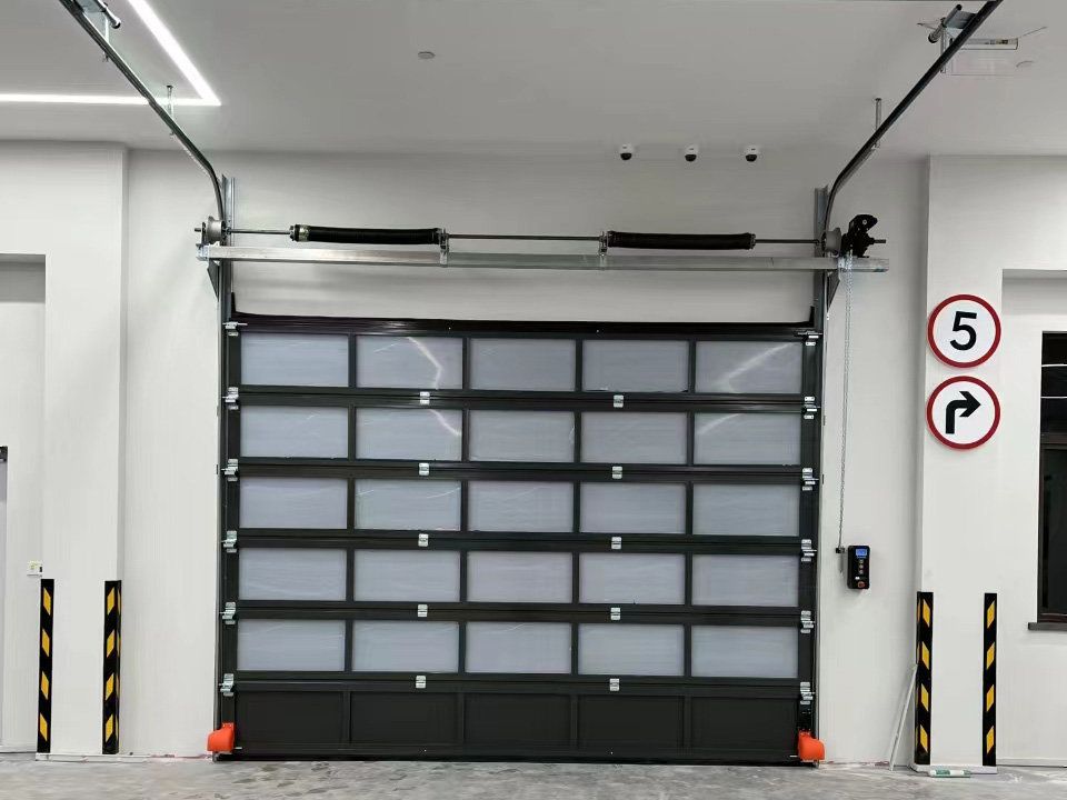 Industrial transparent sectional door
