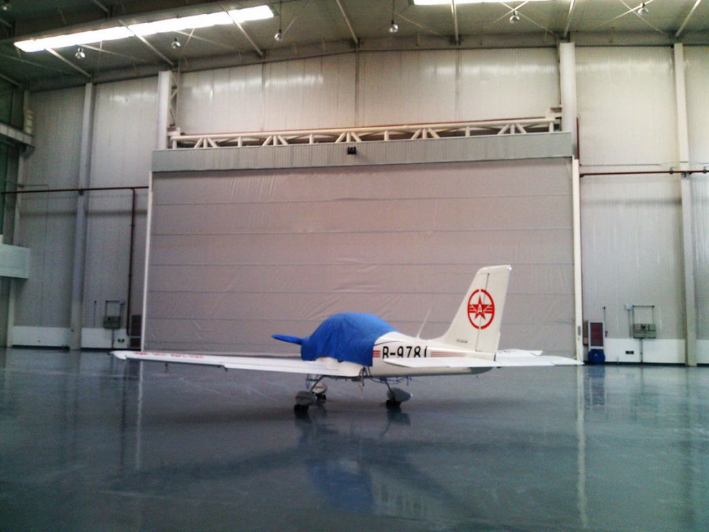 Flexible hangar door
