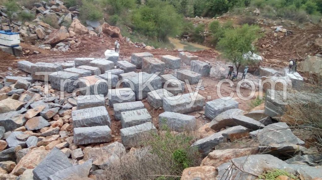 Blue granite slabs and blocks