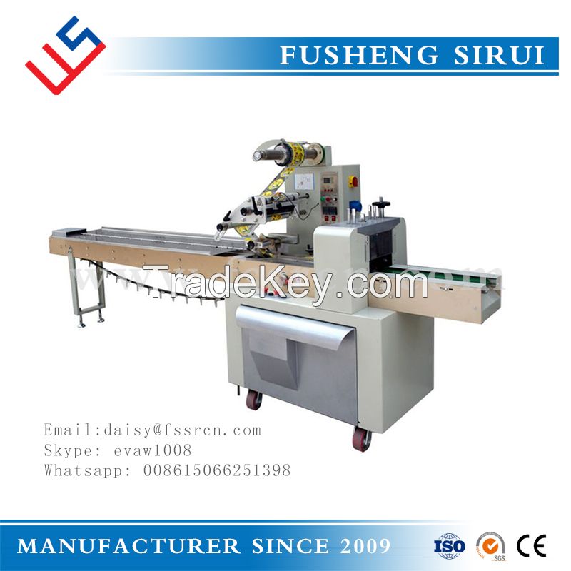 Automatic flow wrapping machine 