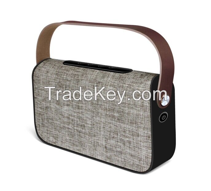 Fabric bluetooth speaker with handle