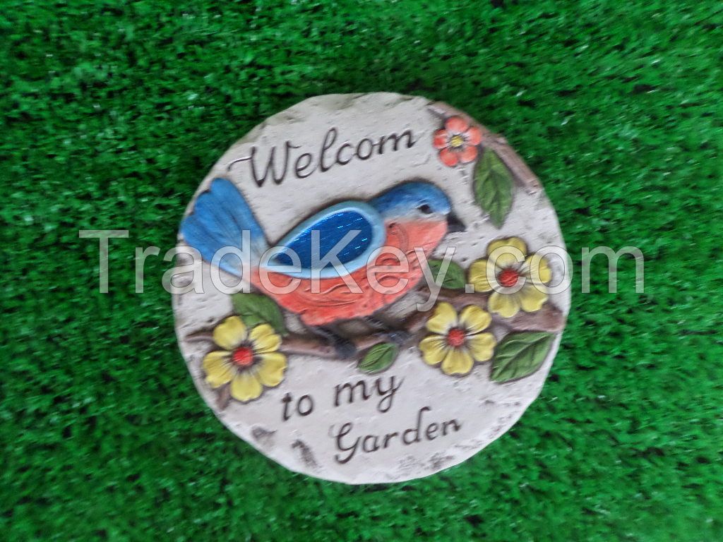 Cement board in garden embossed animals and flowers