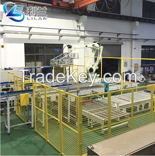 Automatic industrial palletizing robot for cartons of milk bottles for cartons