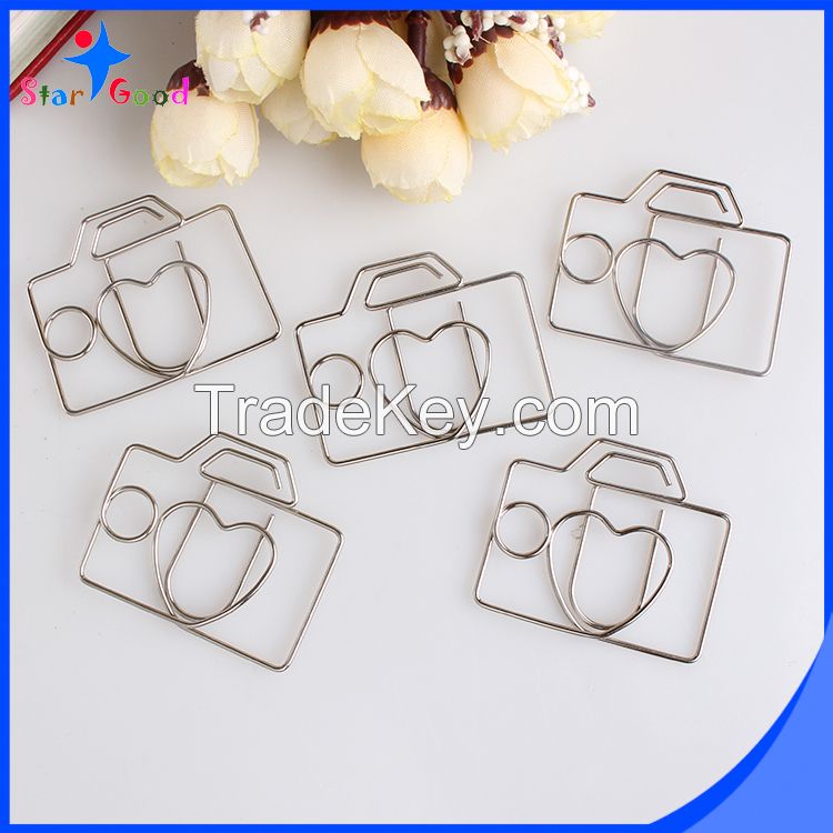 assorted silver matel animal paper clips