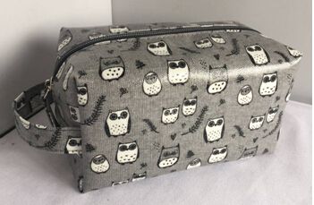 Laminated canvas cosmetic bag with owl pattern