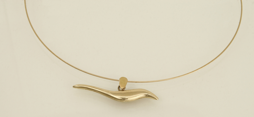 Chain necklace with a 14K gold, dove-like medallion