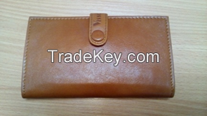 bags, cell phone and tablet cases, purses, wallets, key cases, backpacks, cosmetic bags, document cases, card holders, belts