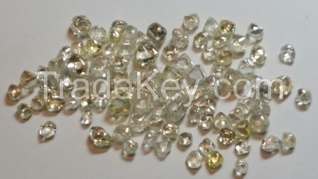 Rough natural diamonds and gold
