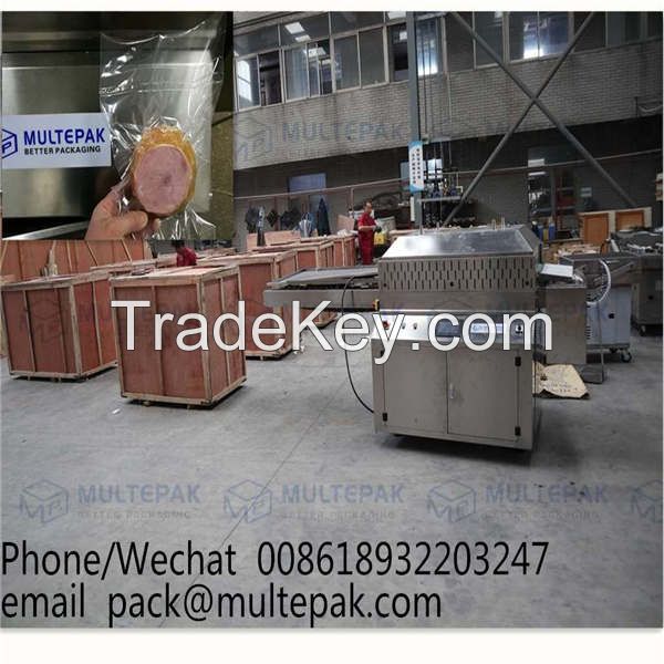 multepak automatic conveyorized   belt band vacuum packaging machine   for meat sausage dates