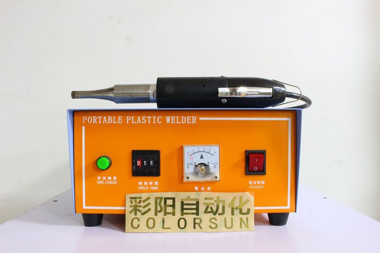 Handheld ultrasonic welding machine.Ultrasonic spot welder