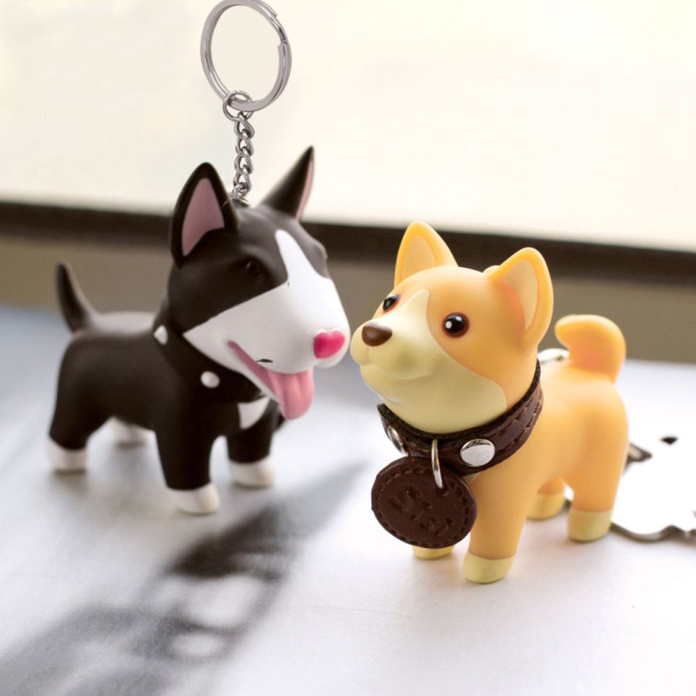 Free design service cheap customized key chains cute dog shape soft PVC keychains for wholsale