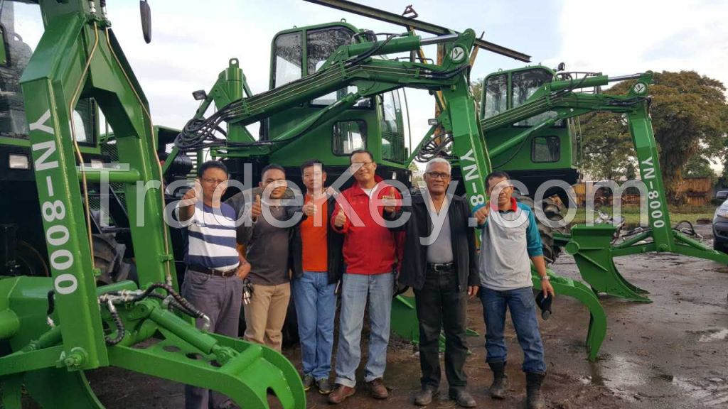 Sugarcane harvester grab loader 