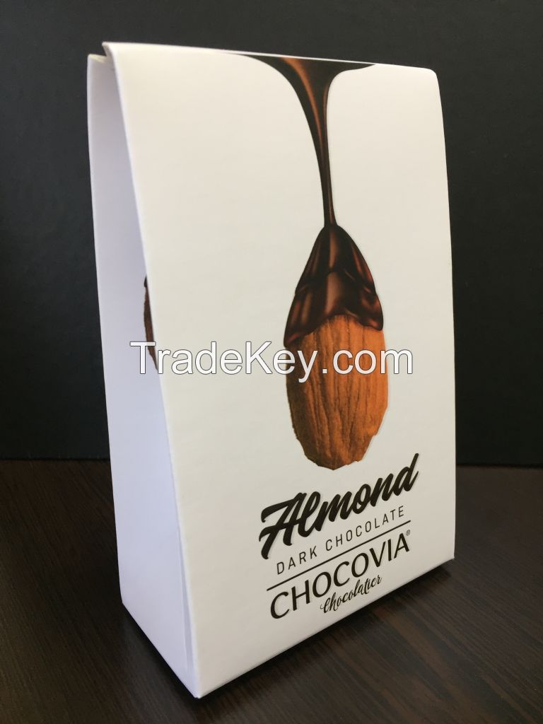 Chocolate coated nuts in elegant boxes