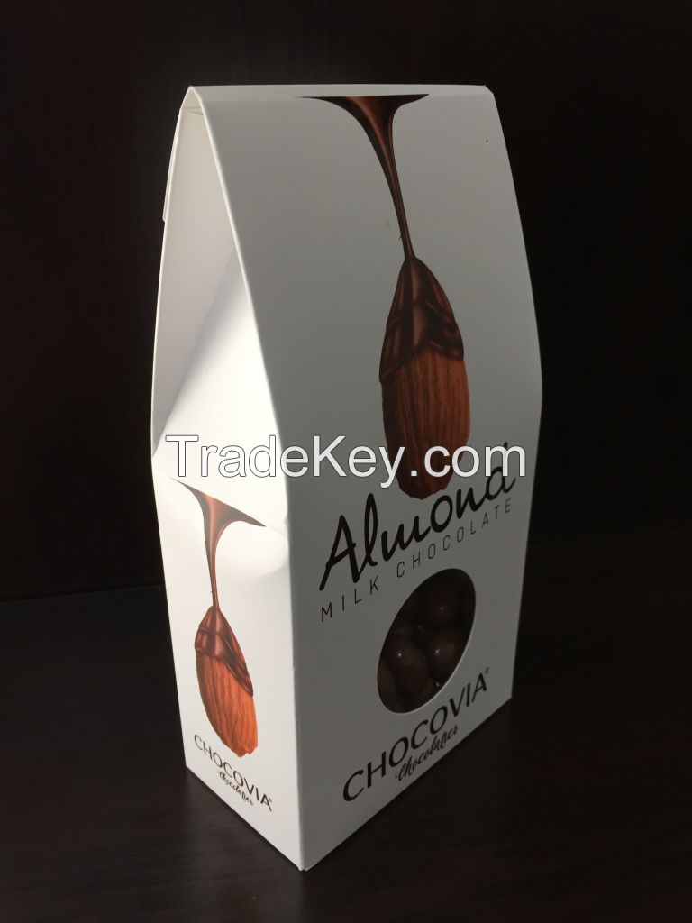 Chocolate coated nuts in elegant boxes