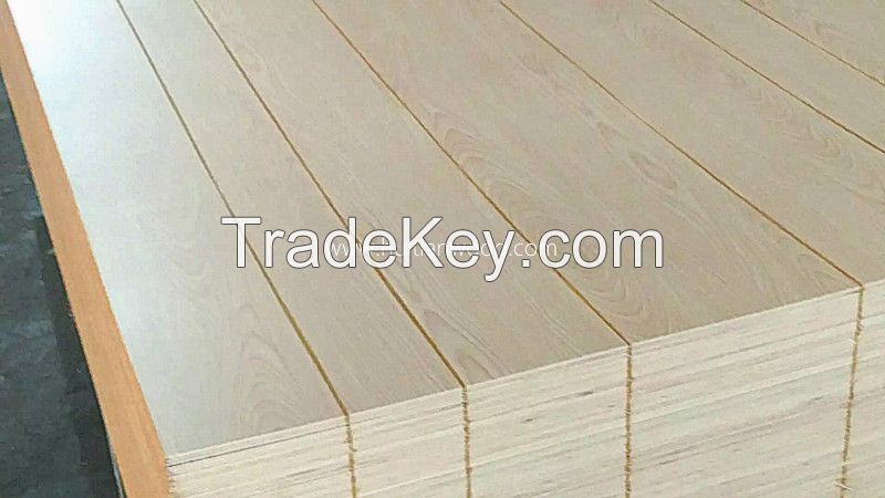 Grooved paper ceiling plywood