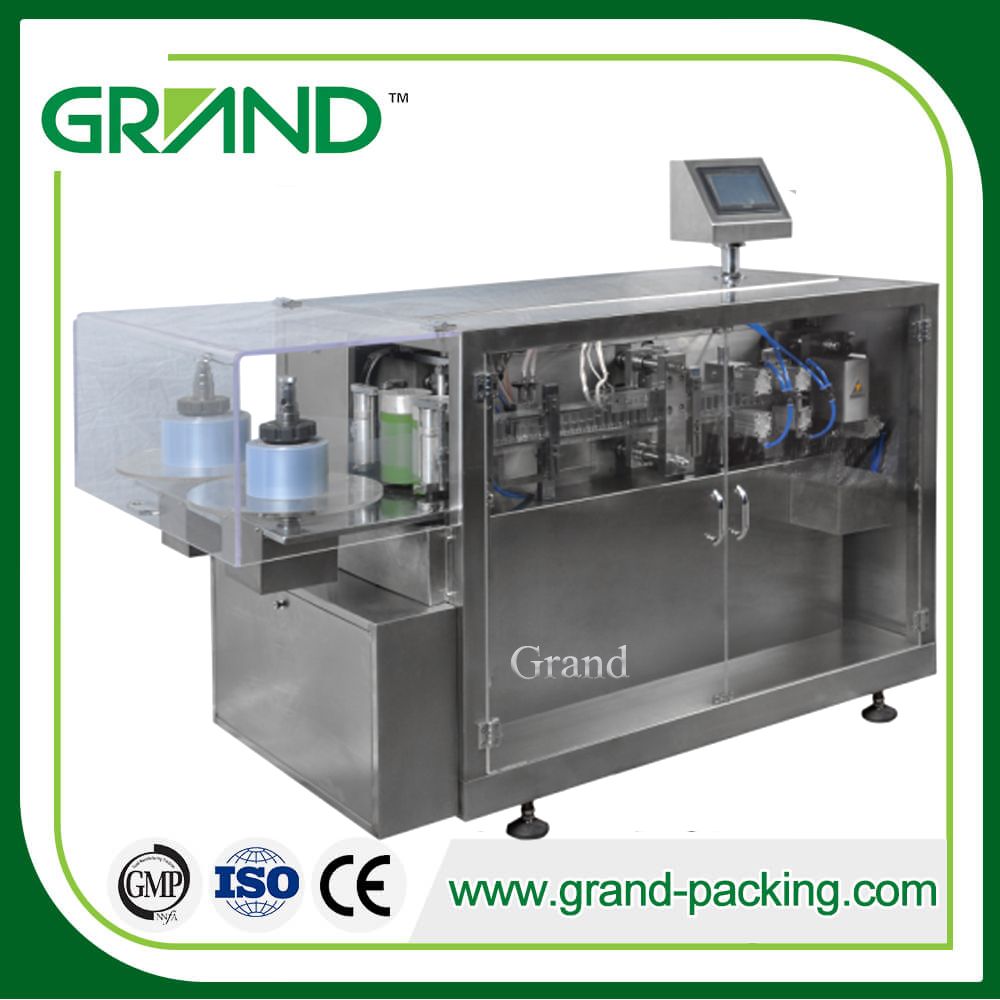 Automatic small dosage plastic ampoule filling and sealing machine for