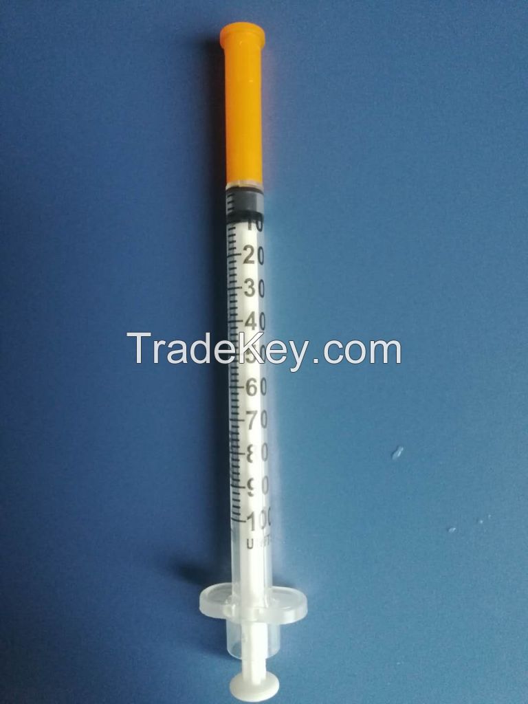 Disposable insulin syringe with needle