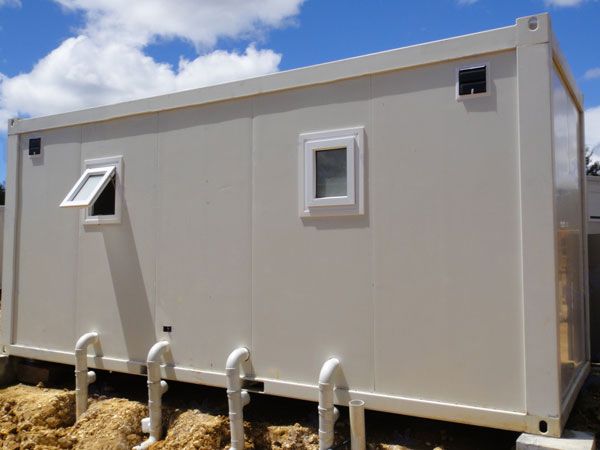 Portable sanitary container house