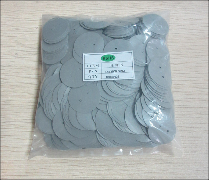 Silicone sheet silicone rubber sheet diameter 35mm with 2 holes distance 10mm thermal conductivity coefficient 0.6w/m.k - 1.0w/m.k