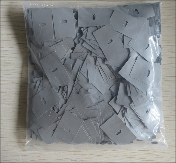 Silicone sheet silicone rubber sheet diameter 35mm with 2 holes distance 10mm thermal conductivity coefficient 0.6w/m.k - 1.0w/m.k