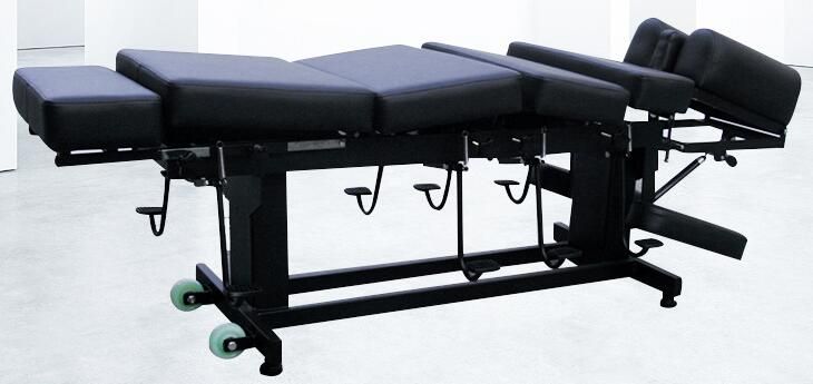 manually controlled 4 drops chiropractic treatment table