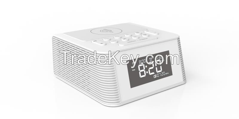 ALARM CLOCK WITH WIRELESS CHARGING RADIO SPEADERS