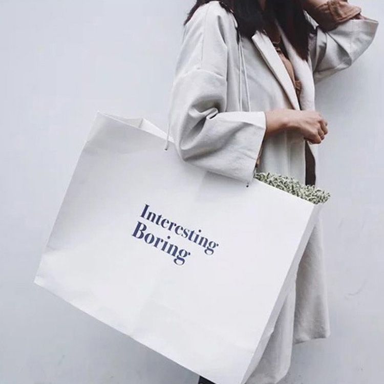 Big size handel white apparel package paper bags custom print