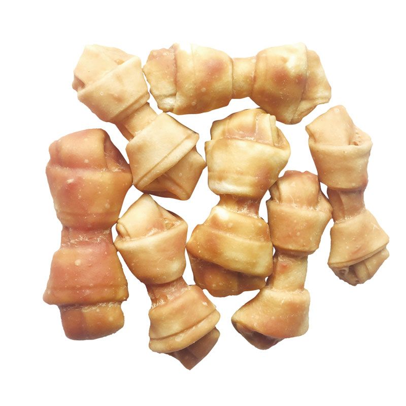 dog snacks rawhide knotted bone and chicken slurry