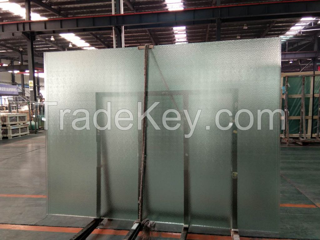 Patterned laminated glass