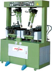 Four--column double--side hydraulic automatic feeding machine