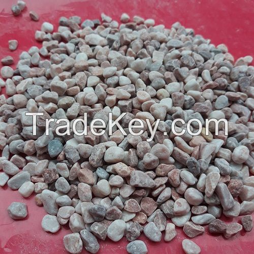 Pink pebbles for aquarium and garden paving