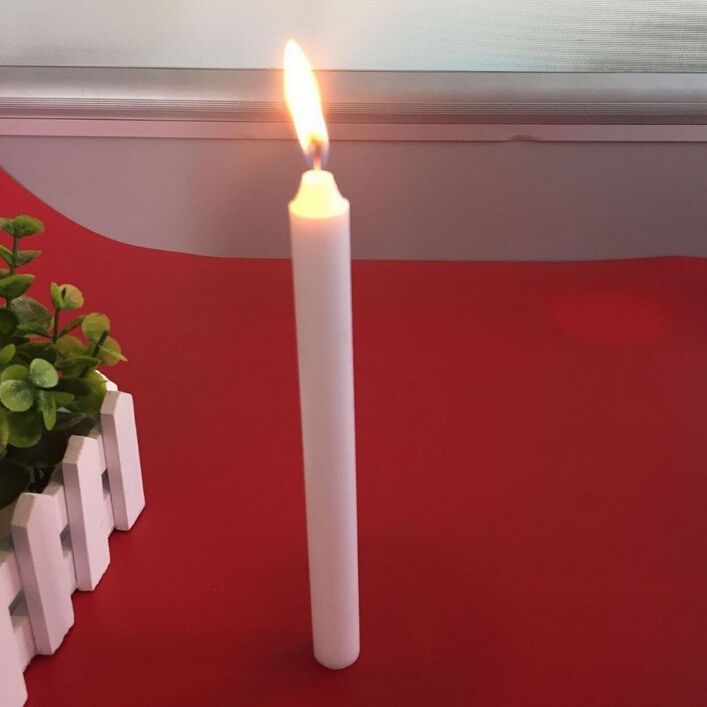 white candle for household lighting
