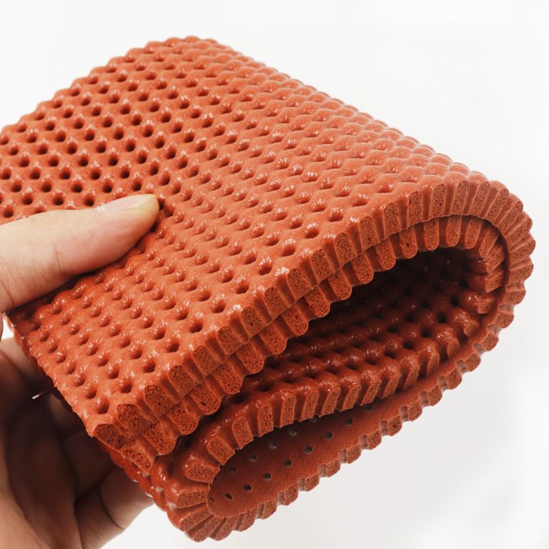 Perforated silicone foam pad for cloth ironing table