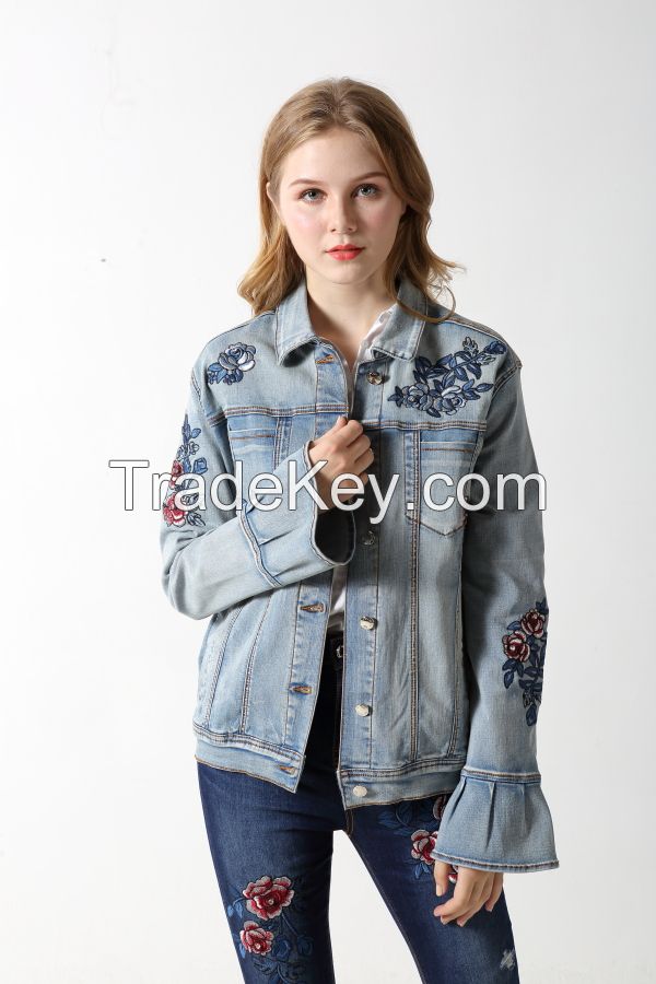 Woman's stretch denim jacket with embroidery and sparling