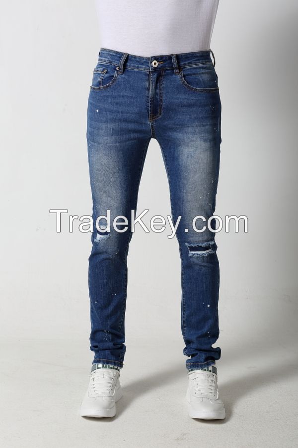 Men's Slim denim jeans with distressed and patches
