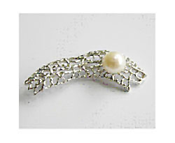 white pearl brooch