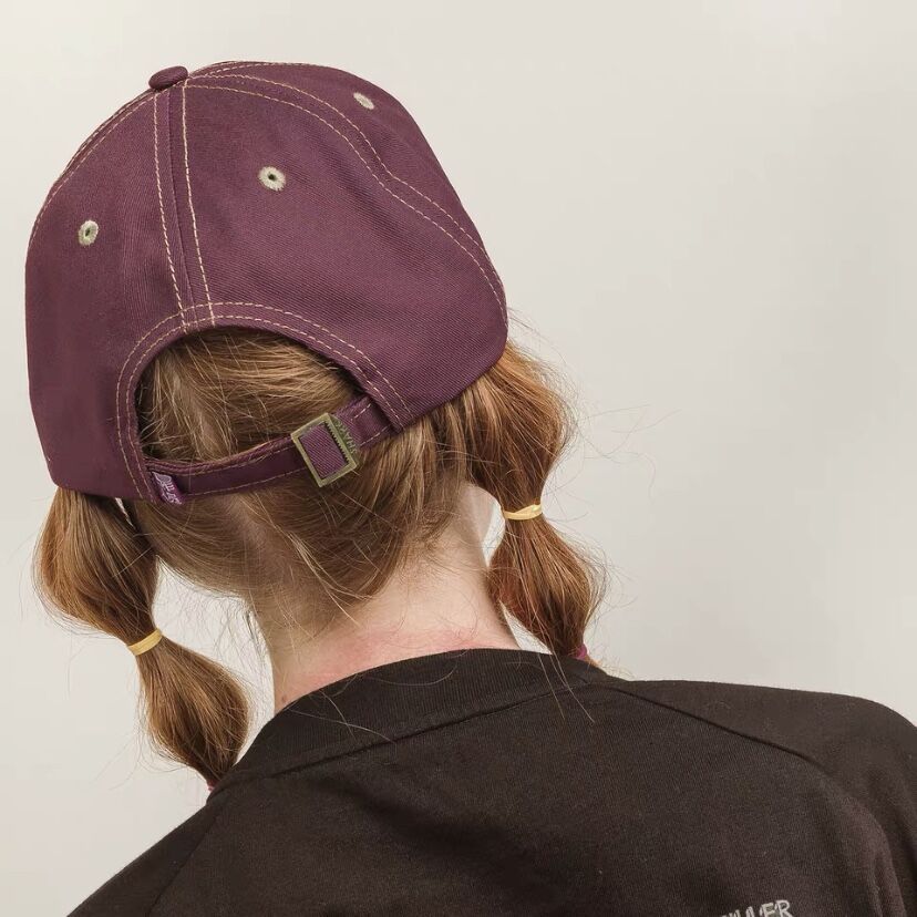 purple baseball cap