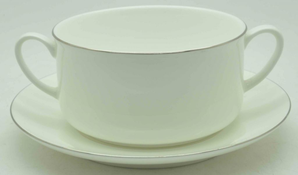White fine bone china with overglazed color figure
