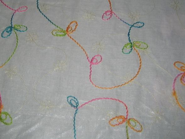 corded embroidery on 100% foil cotton