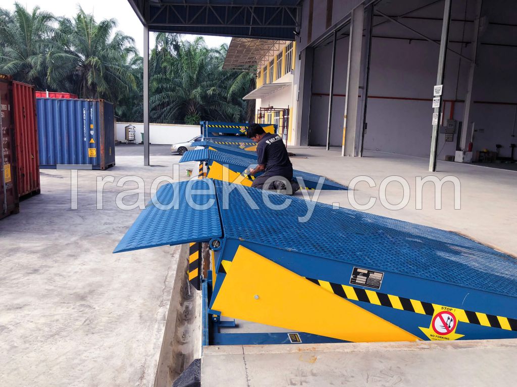 Dock leveller loading systems