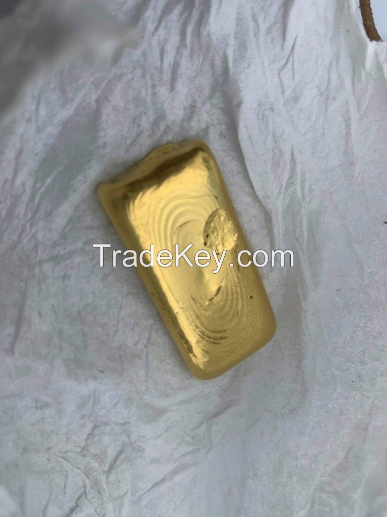 Gold bar and dust