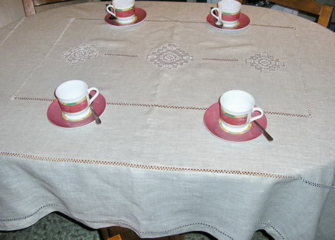 Linen tablecloth with hand made embroidery