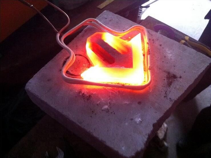 Low frequency induction heating machine for rebar preheating