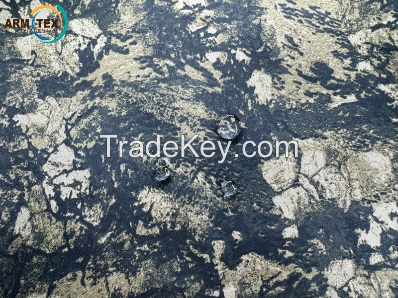 ### Description of Dewspo Fleece Camo Fabric