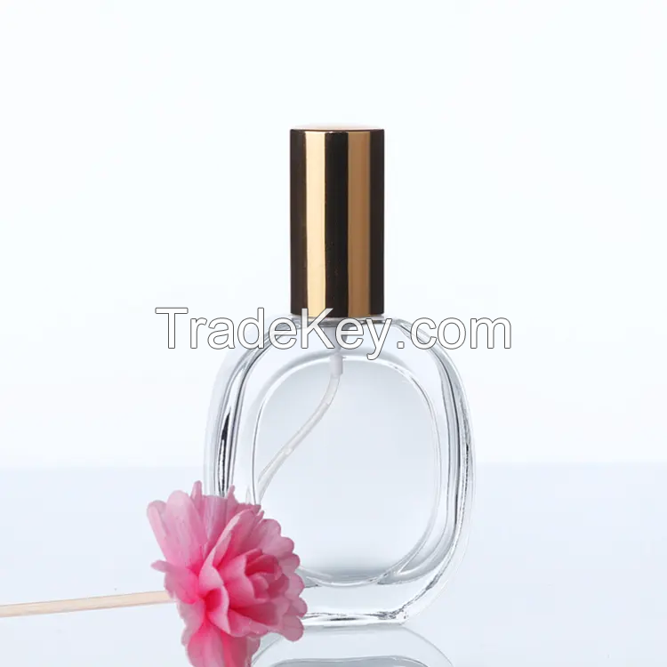 50ml Transparent Oval Shape Perfume Bottle Mist Spray Top Glass Bottle with Golden Sliver Lid