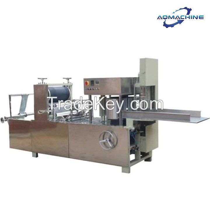 Nonwoven embossing and folding machine