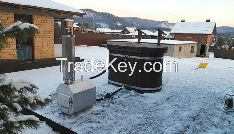 Cedar plunge tub with external wood stove and plastic bowl with cedar seats