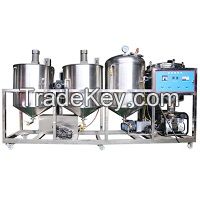 Vegetable oil refinery machine with vacuum tank